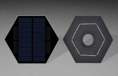 Two hexagonal solar panels, one with visible cells and one with a circular center opening
