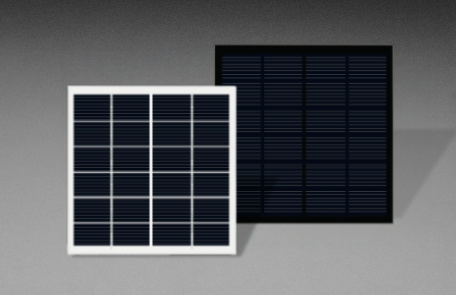 Two square solar panels showing different surface finishes and corner designs